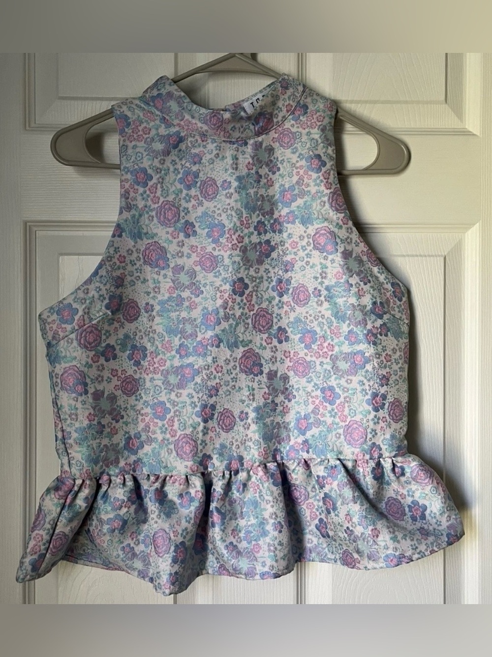 TCEC Floral Jacquard Ruffle Trim Peplum Top in Lavender, Blue, and Pink